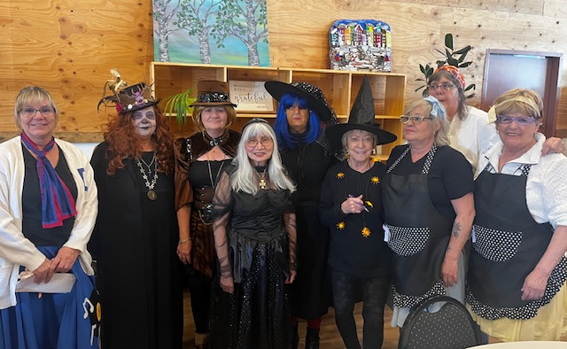 Staff and volunteers dressed up for a Halloween event